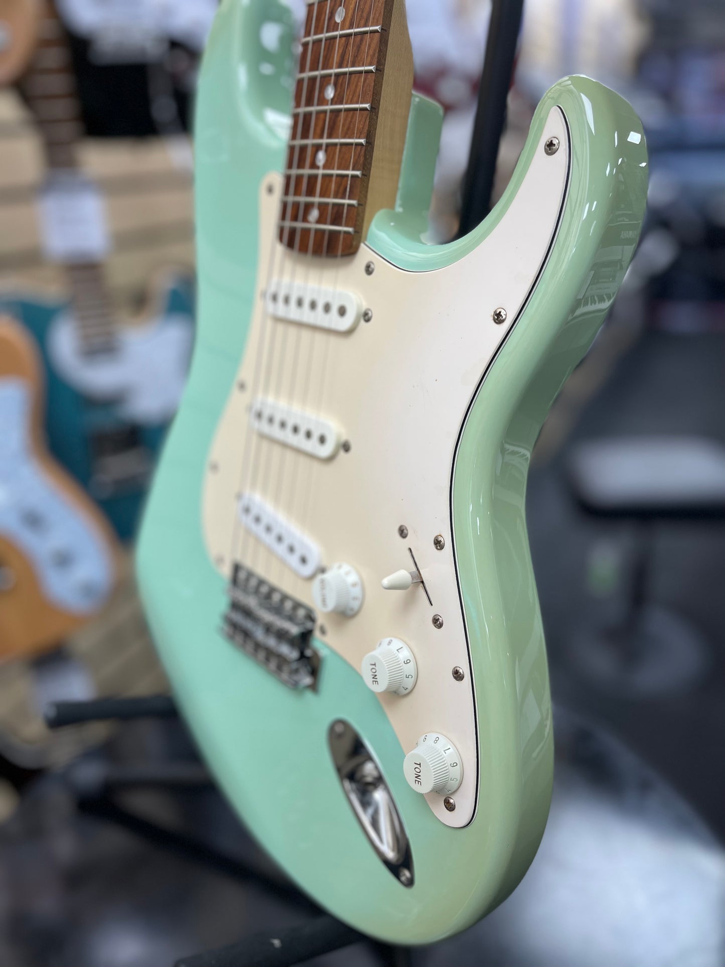 Squier by Fender Stratocaster Electric Guitar - Surf Green.