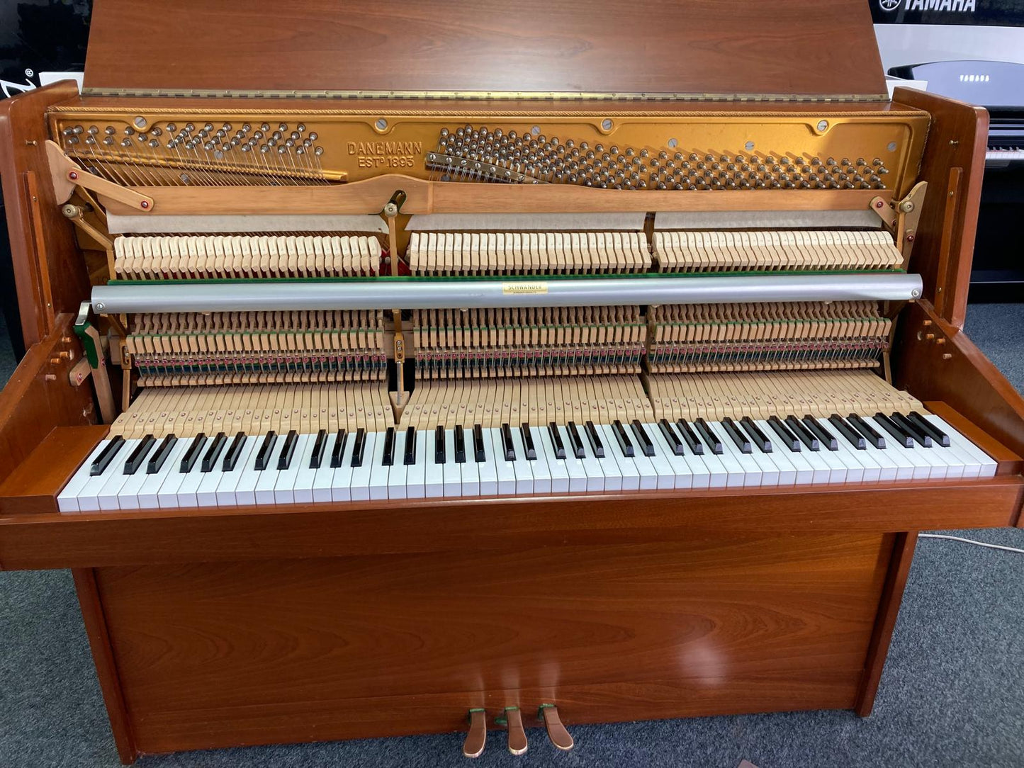 Used Danemann 7 & 1/4 Octave Upright Piano